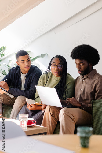 A diverse team of professionals convenes for a relaxed discussion