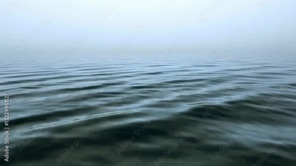 Serene foggy waters with gentle ripples reflecting a tranquil atmosphere at dawn Serene foggy waters with gentle ripples reflecting a tranquil atmosphere at dawn