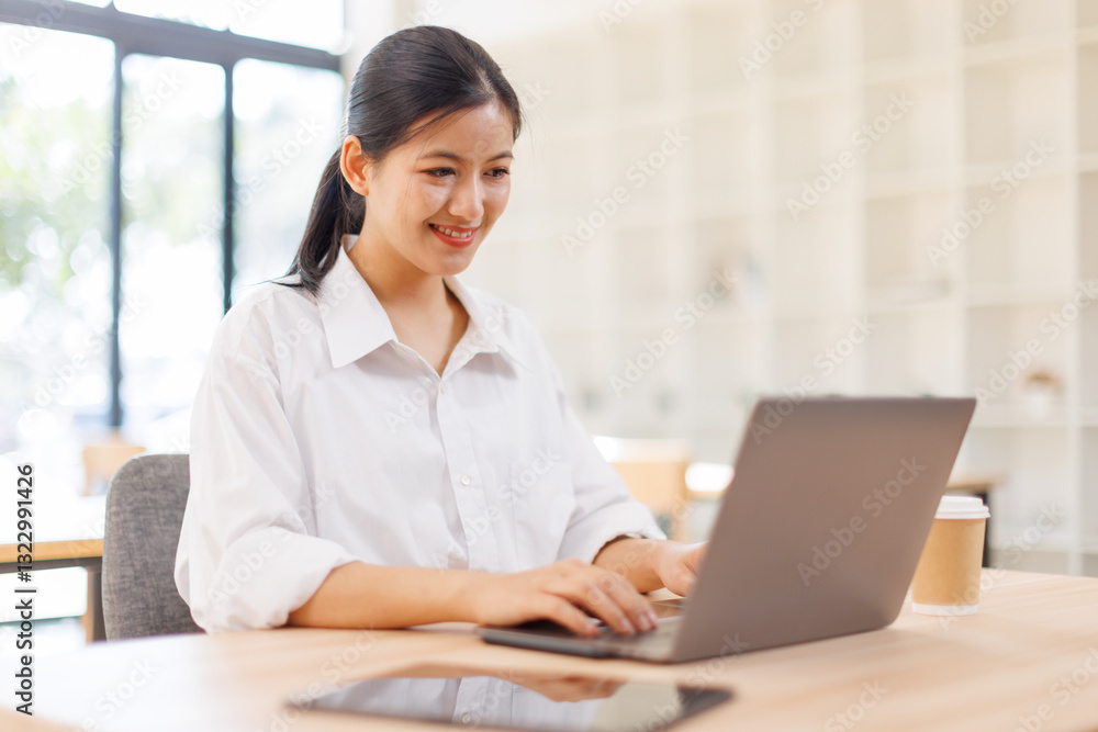 Asian Business woman doing on laptop math finance on an office desk, tax, report, accounting, statistics, and analytical research concept
Asian Business woman doing on laptop math finance on an office desk, tax, report, accounting, statistics, and analytical research concept