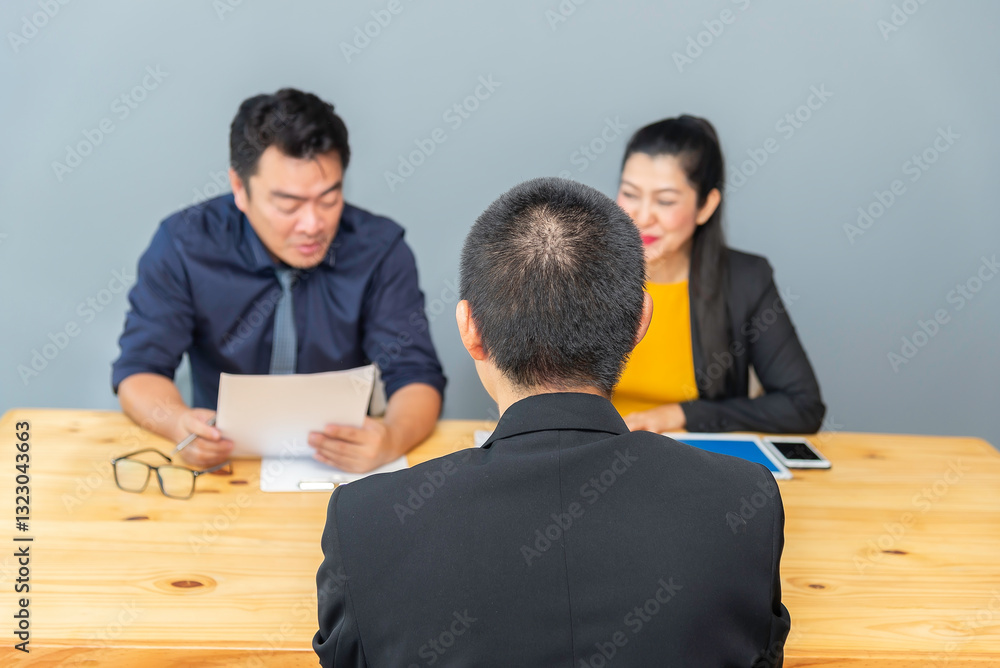 Manager Businesswoman interview employee face to face sitting in meeting room. Job Interview Concept. Manager Businesswoman interview employee face to face sitting in meeting room. Job Interview Concept.
