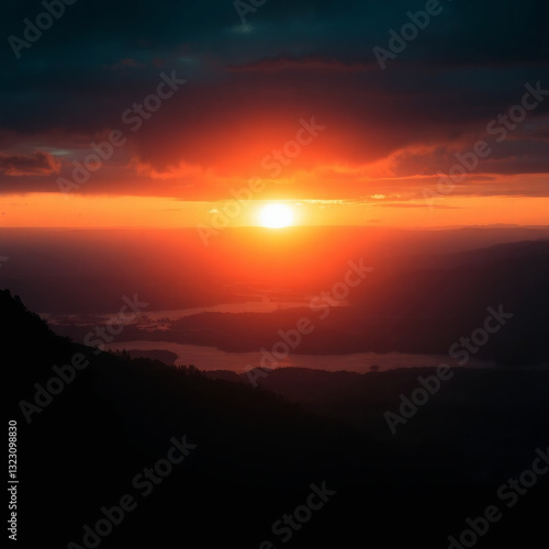 Breathtaking sunset over a tranquil landscape photo