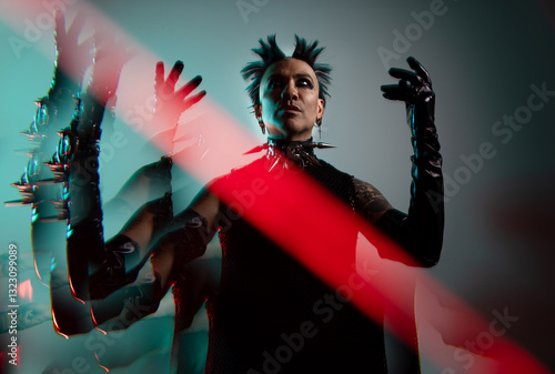 Dramatic portrait of man in eccentric punk fashion photo