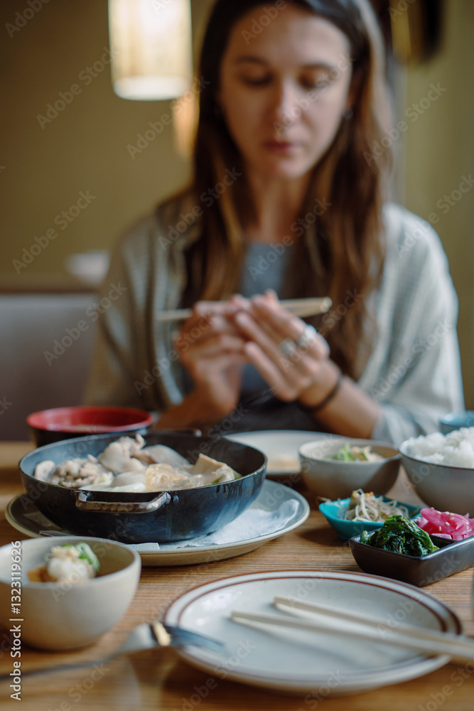 Woman Eating Japanese Hotpot Woman Eating Japanese Hotpot