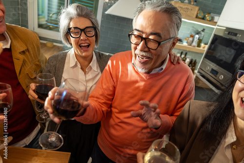 Elderly Diverse Friends Enjoying Laughter and Wine at a Cozy Gathering photo