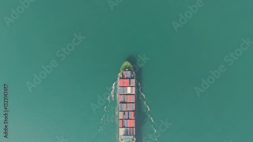 Aerial top view container ship transportation container for business logistics, export import or freight transportation.