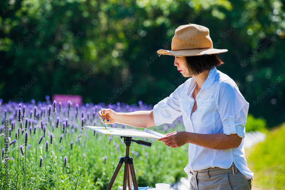Artist Painting Watercolor in Blooming Lavender Field Summer Day Artist Painting Watercolor in Blooming Lavender Field Summer Day