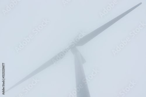 Spinning Wind Turbines in the fog