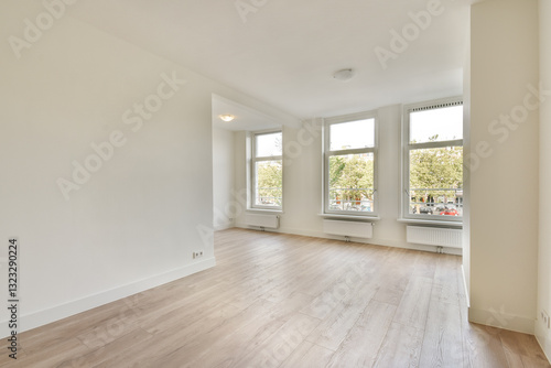 Wallpaper Mural An inviting empty room featuring large windows that flood the space with natural light, showcasing clean lines and a fresh feel. Torontodigital.ca