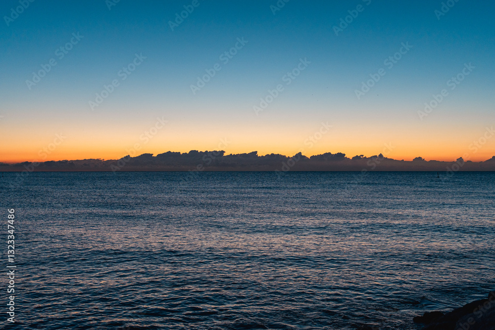 Naklejka premium sunset over the sea