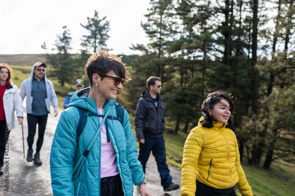 Hikers walking and enjoying mountain landscape in Spain Hikers walking and enjoying mountain landscape in Spain