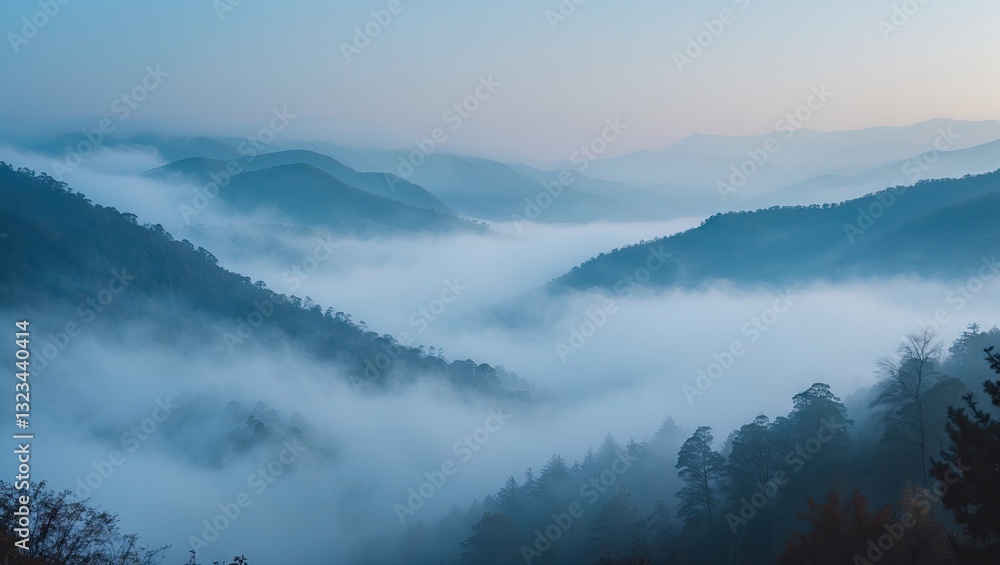 Serene fog-covered blue mountains at dawn with misty valleys and soft light illuminating layered peaks in a tranquil landscape scene Serene fog-covered blue mountains at dawn with misty valleys and soft light illuminating layered peaks in a tranquil landscape scene