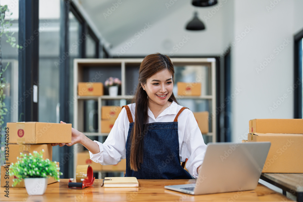 Excited young woman celebrating success while using computer laptop to see data delivery products customer profit Selling products of This month Excited young woman celebrating success while using computer laptop to see data delivery products customer profit Selling products of This month