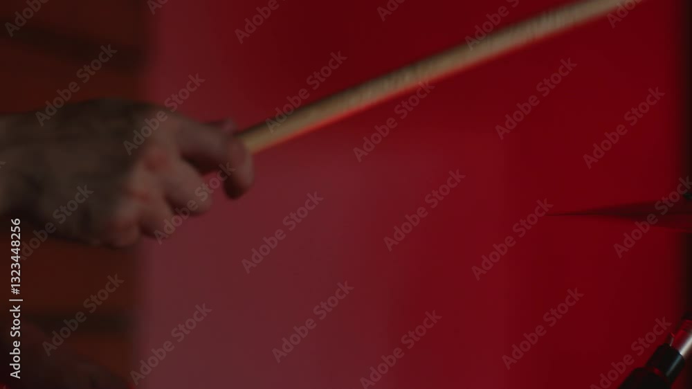 A closeup shot of drums features dramatic lighting, creating an artistic and abstract scene A closeup shot of drums features dramatic lighting, creating an artistic and abstract scene