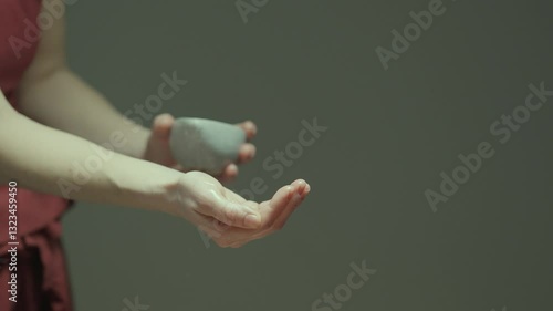 Massage therapist pours oil on a spa treatment