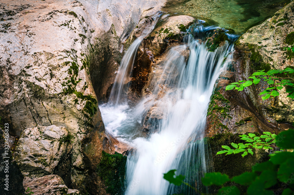 Obraz premium Immersion in the greenery. Kobarid natural waterfalls of Kozjak. Wonder of nature
