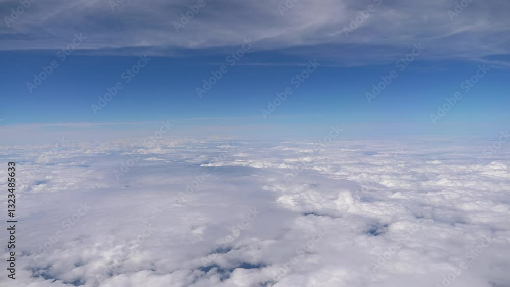 Soaring High Above Beautiful Fluffy Clouds on a Sunny Day in 4k Soaring High Above Beautiful Fluffy Clouds on a Sunny Day in 4k