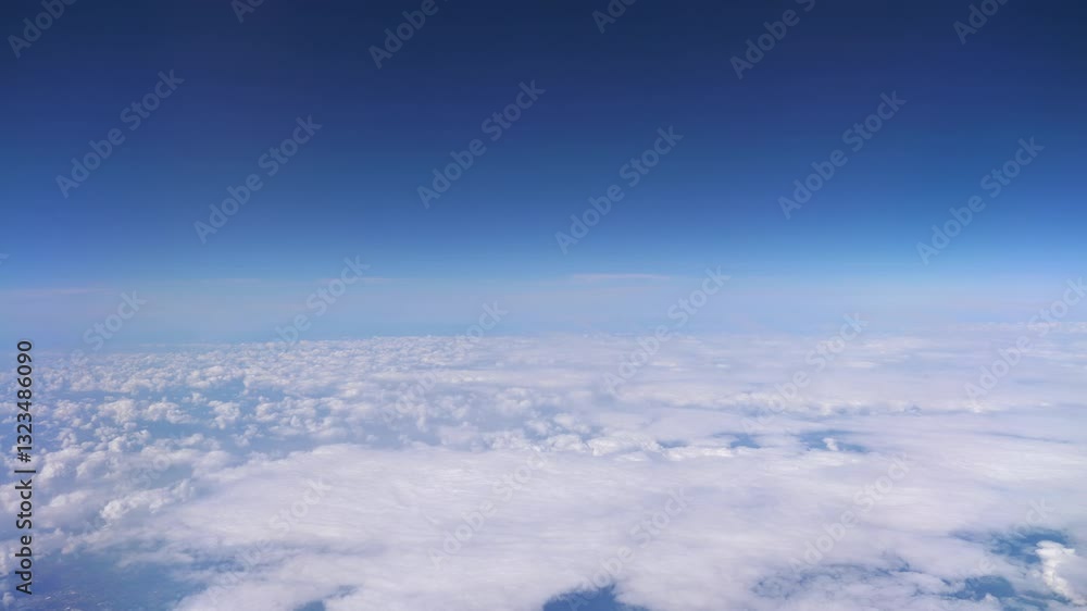 Soaring High Above Beautiful Fluffy Clouds on a Sunny Day in 4k Soaring High Above Beautiful Fluffy Clouds on a Sunny Day in 4k