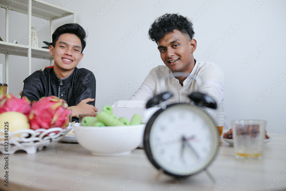 Portrait of Diverse Muslim Men Smiling To Camera While Enjoying Iftar Dinner on Ramadan Kareem Portrait of Diverse Muslim Men Smiling To Camera While Enjoying Iftar Dinner on Ramadan Kareem
