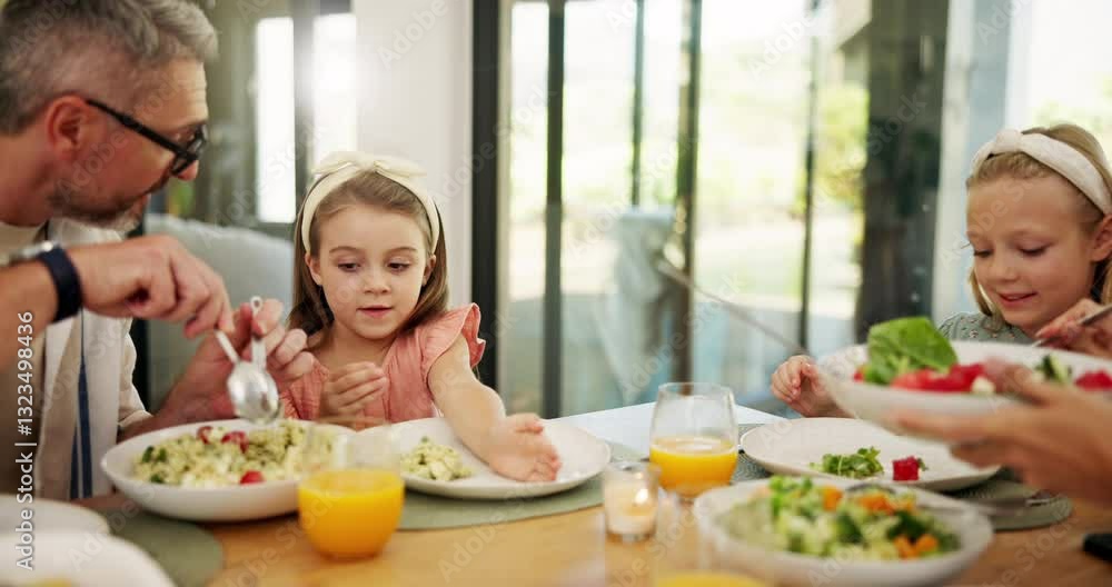Family, eating or dishing with food for healthy lunch, salad diet or enjoying chicken meal at home. Mom, dad and hungry children with plate serving, thanks giving dinner or vegetables for nutrition Family, eating or dishing with food for healthy lunch, salad diet or enjoying chicken meal at home. Mom, dad and hungry children with plate serving, thanks giving dinner or vegetables for nutrition