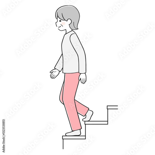 階段を元気に降りるシニア女性