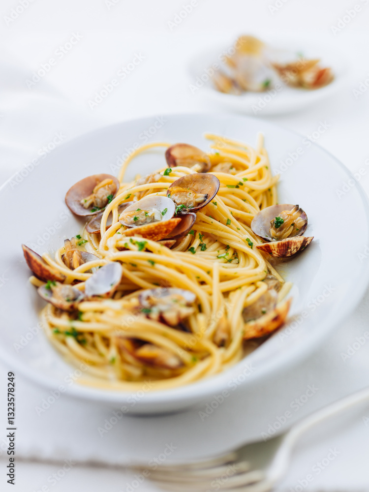 pasta dish with fresh clams, herbs and garlic pasta dish with fresh clams, herbs and garlic