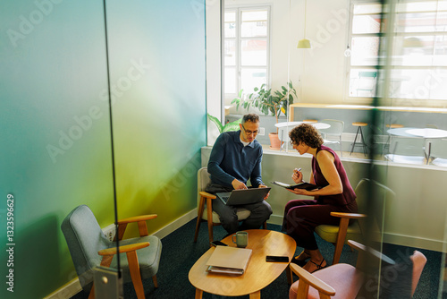 Business people working together in modern office room