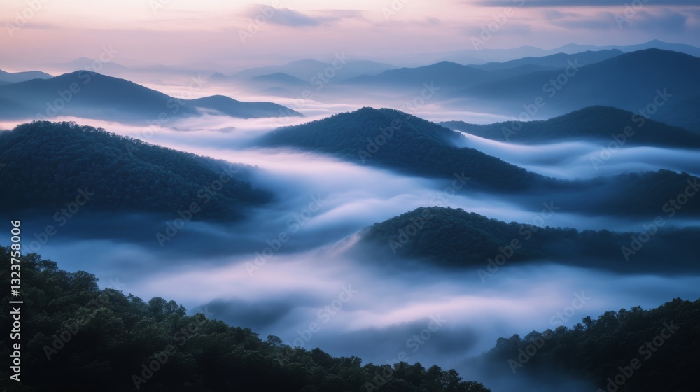 Fototapeta premium Gentle mist blankets rolling hills at twilight, offering a serene and mystical vista with lush greenery peeking through the ethereal veil.