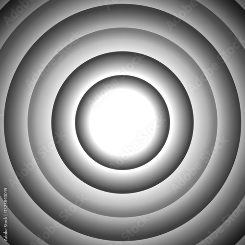 Concentric circular ripples in varying shades of gray radiate from a bright white center, creating a soft, gradient effect.