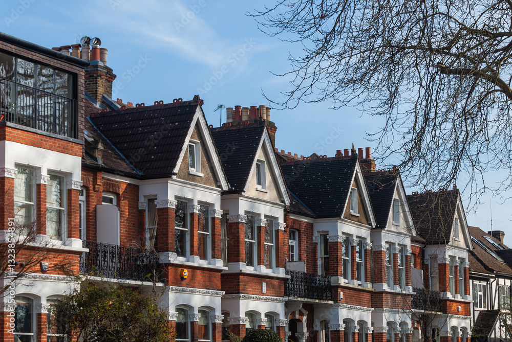 Fototapeta premium Old brick houses in Barnes, South West London, Barnes village, London, England. Distinctive English architecture.