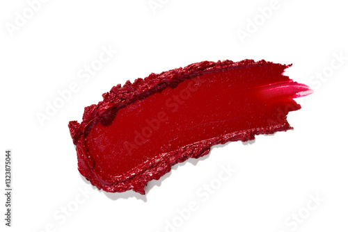 Lipstick smear smudge swatch isolated on white background. Cosmetic makeup texture. Red color cosmetic product brush stroke sample