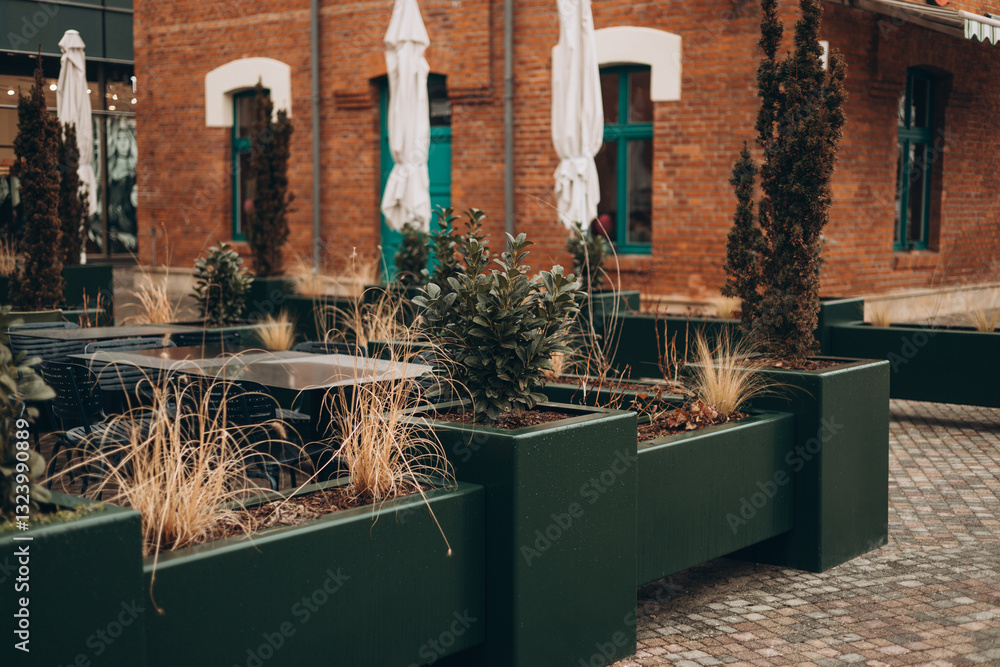 Outdoor cafe seating with tables and chairs