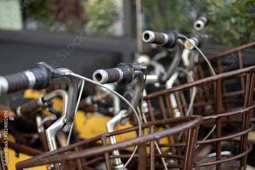 Obraz na płótnie Bicycle parking in the city. Ecological type of transport. Close-up. Renting bicycles for exploring the city w salonie