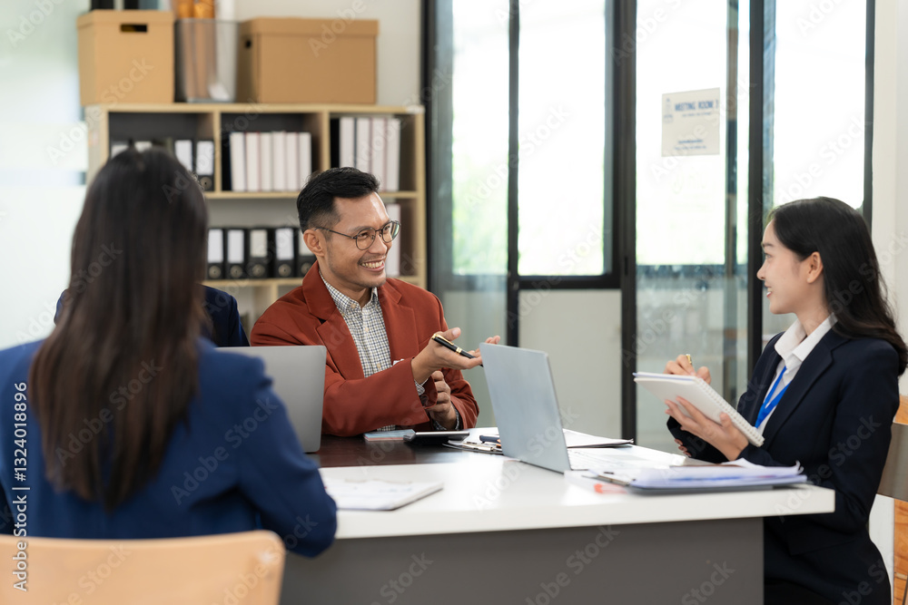 Asian business team working with analytical reports and consultants showing plans, financial analysis Asian business team working with analytical reports and consultants showing plans, financial analysis