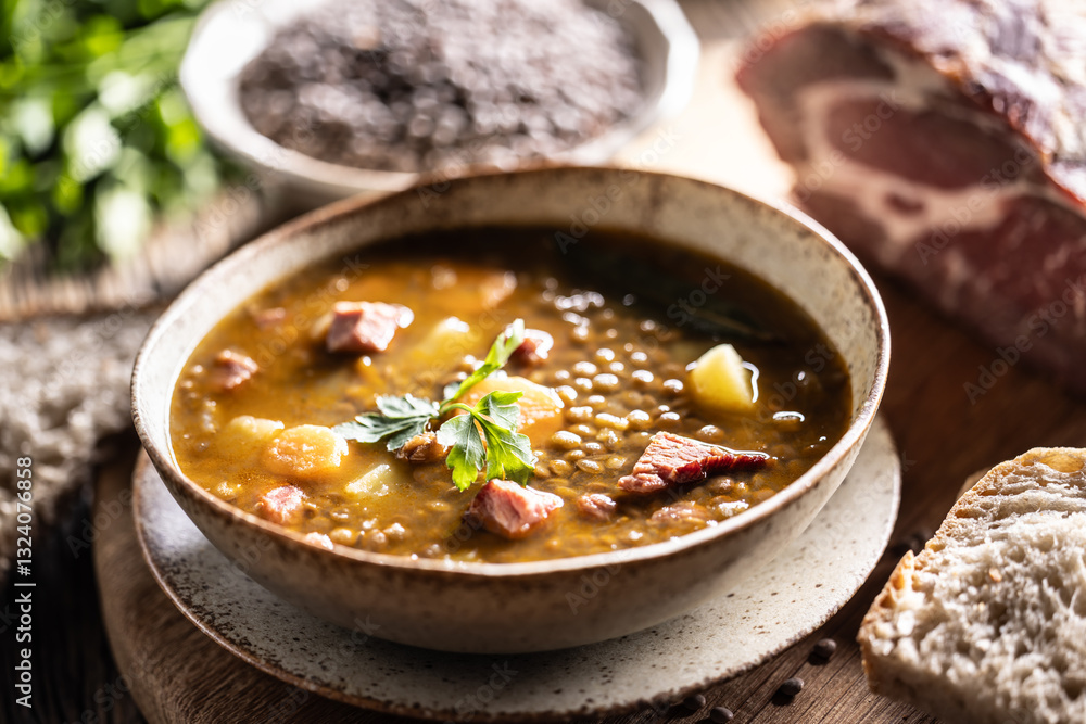 Lentil stew or soup with smoked pork meat, traditional Slovak or Czechv food