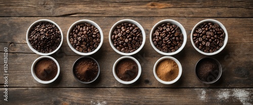 Preparing fresh roast coffee beans to brew, featuring an overhead perspective of four different bean varieties alongside their respective ground powder in small dishes on a rustic background.