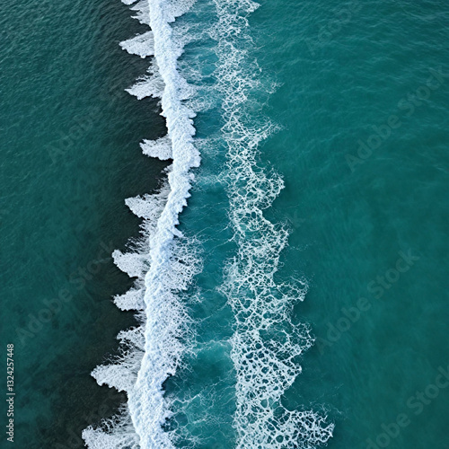 Aerial view beautiful of sea waves from drone. Stock image of blue color of ocean water, sea surface. Top view on turquoise waves, clear water surface texture.