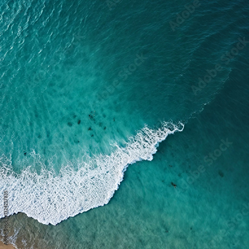 Aerial view beautiful of sea waves from drone. Stock image of blue color of ocean water, sea surface. Top view on turquoise waves, clear water surface texture.