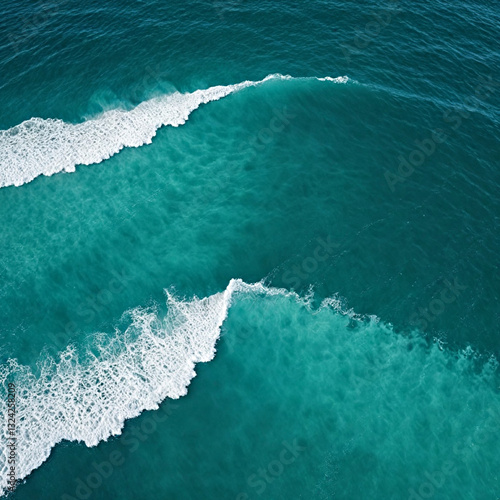 Aerial view beautiful of sea waves from drone. Stock image of blue color of ocean water, sea surface. Top view on turquoise waves, clear water surface texture.