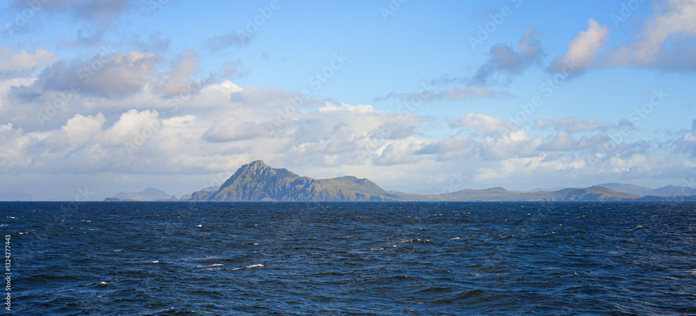 Cliffs of the Cape Horn, the southernmost tip of South America located on the small Hornos Island in the Tierra del Fuego archipelago in Chile Cliffs of the Cape Horn, the southernmost tip of South America located on the small Hornos Island in the Tierra del Fuego archipelago in Chile