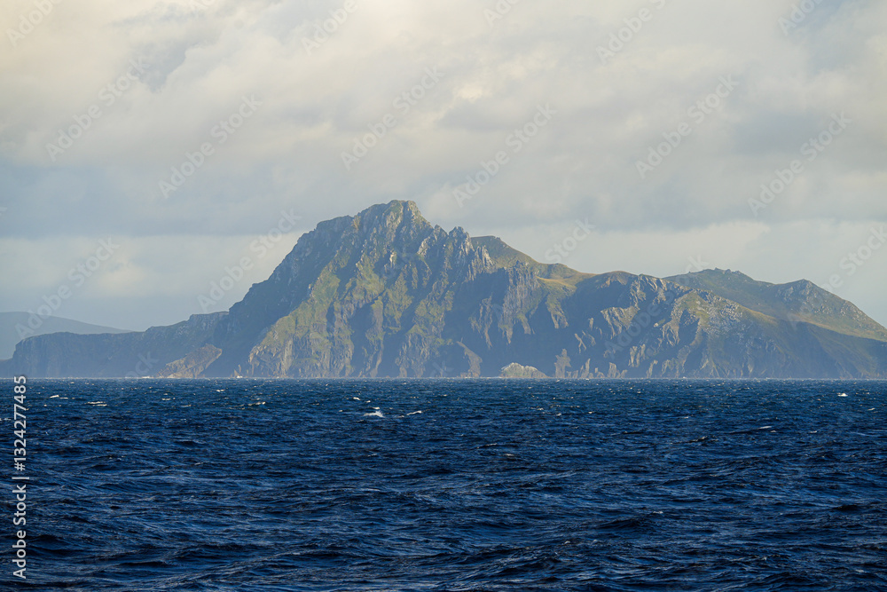 Cliffs of the Cape Horn, the southernmost tip of South America located on the small Hornos Island in the Tierra del Fuego archipelago in Chile Cliffs of the Cape Horn, the southernmost tip of South America located on the small Hornos Island in the Tierra del Fuego archipelago in Chile
