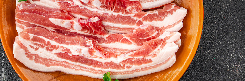 Bacon slices pork meat fresh gourmet food background on the table rustic food top view copy space Bacon slices pork meat fresh gourmet food background on the table rustic food top view copy space