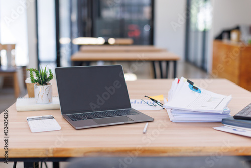 Wallpaper Mural Close up Business Female using calculator and laptop for do math finance on wooden desk, tax, accounting, statistics and analytical research concept	
 Torontodigital.ca