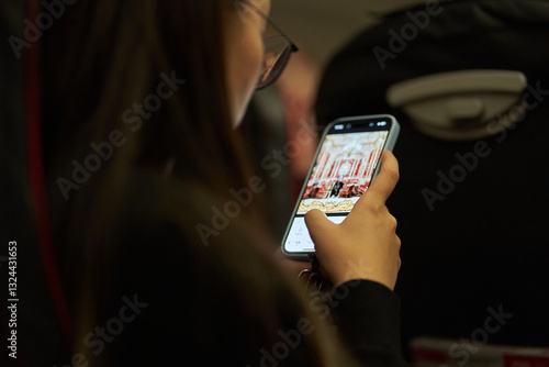 Close-up of a hand shopping online, sending emails, playing on a phone, using a smartphone, browsing social media. High quality photo