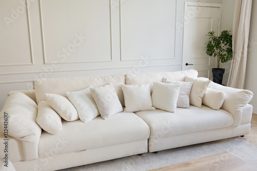White couch with pillows