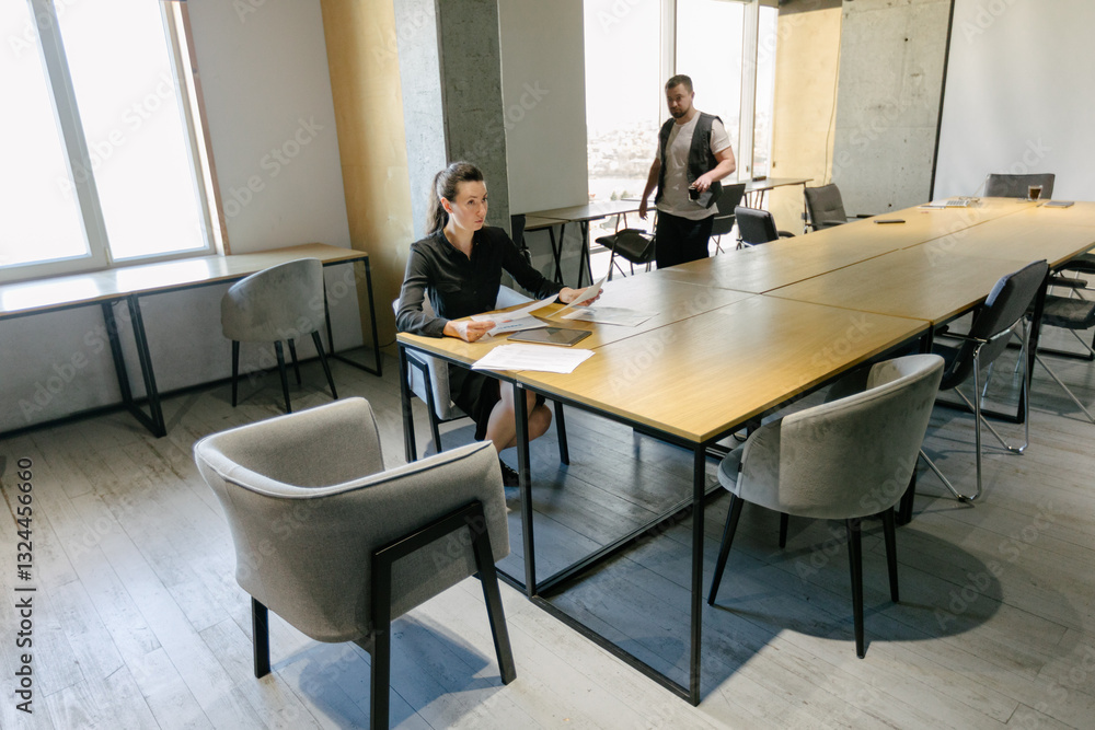 Office workers planning their job Office workers planning their job