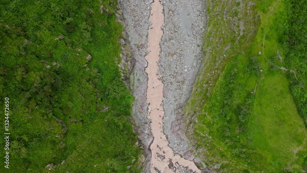 Drone aerial view of flowing mountain river