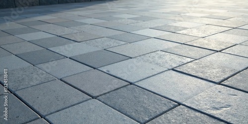 A Textured Perspective of Interlocking Stone Pavers Showing Subtle Variations in Shade and Surface