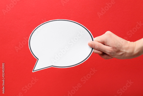 Wallpaper Mural Woman holding blank speech bubble on red background, closeup. Space for text Torontodigital.ca