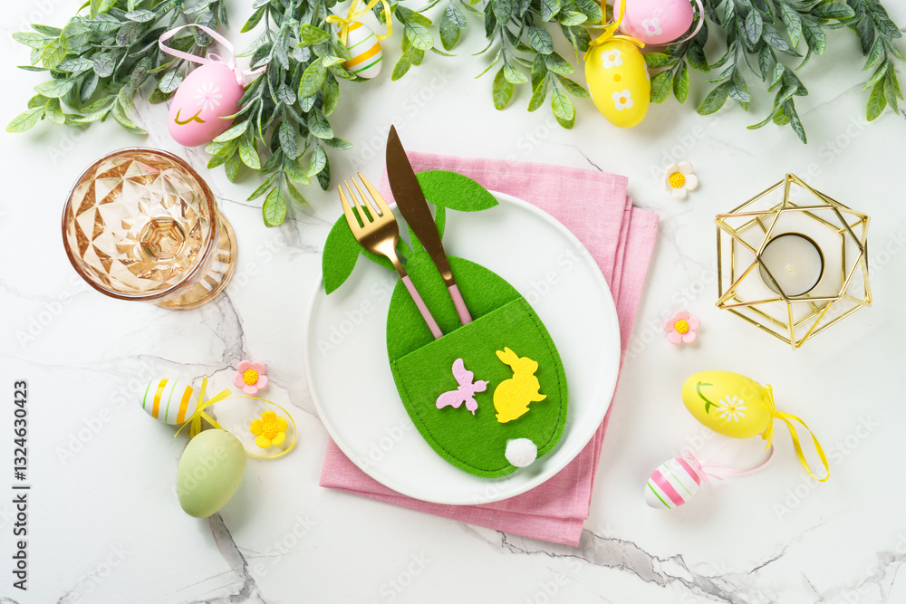 Easter table setting on white background.