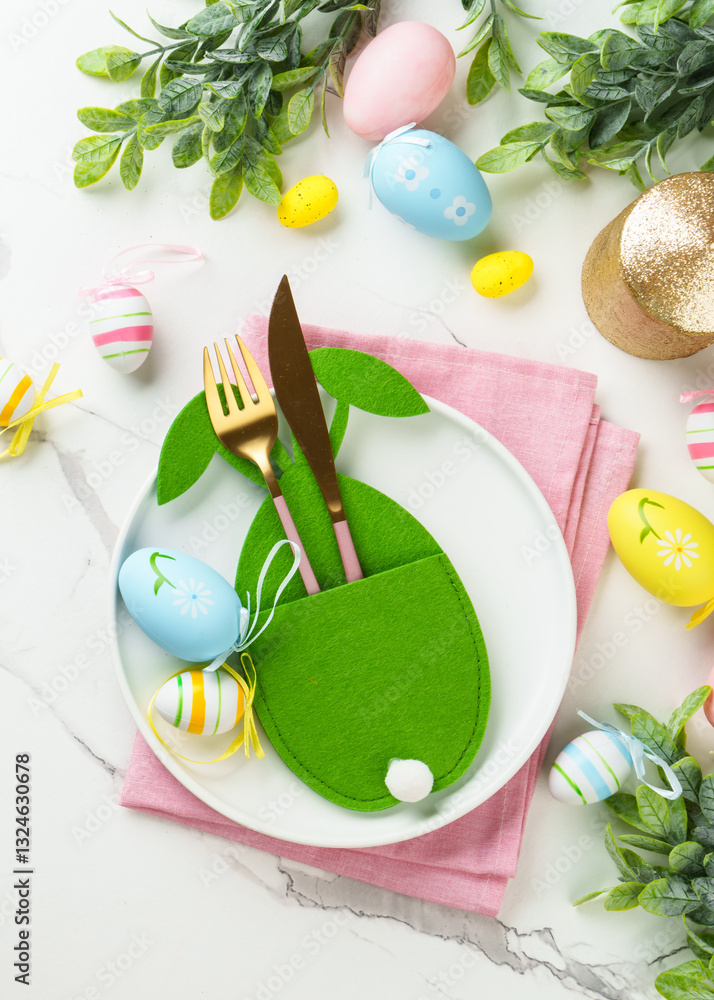 Easter table setting on white background.